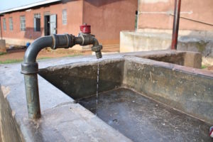 Some of the towns have taps rather than pumps for their water. We pay a small fee when we used this tap to fill our jerry cans for outreach.